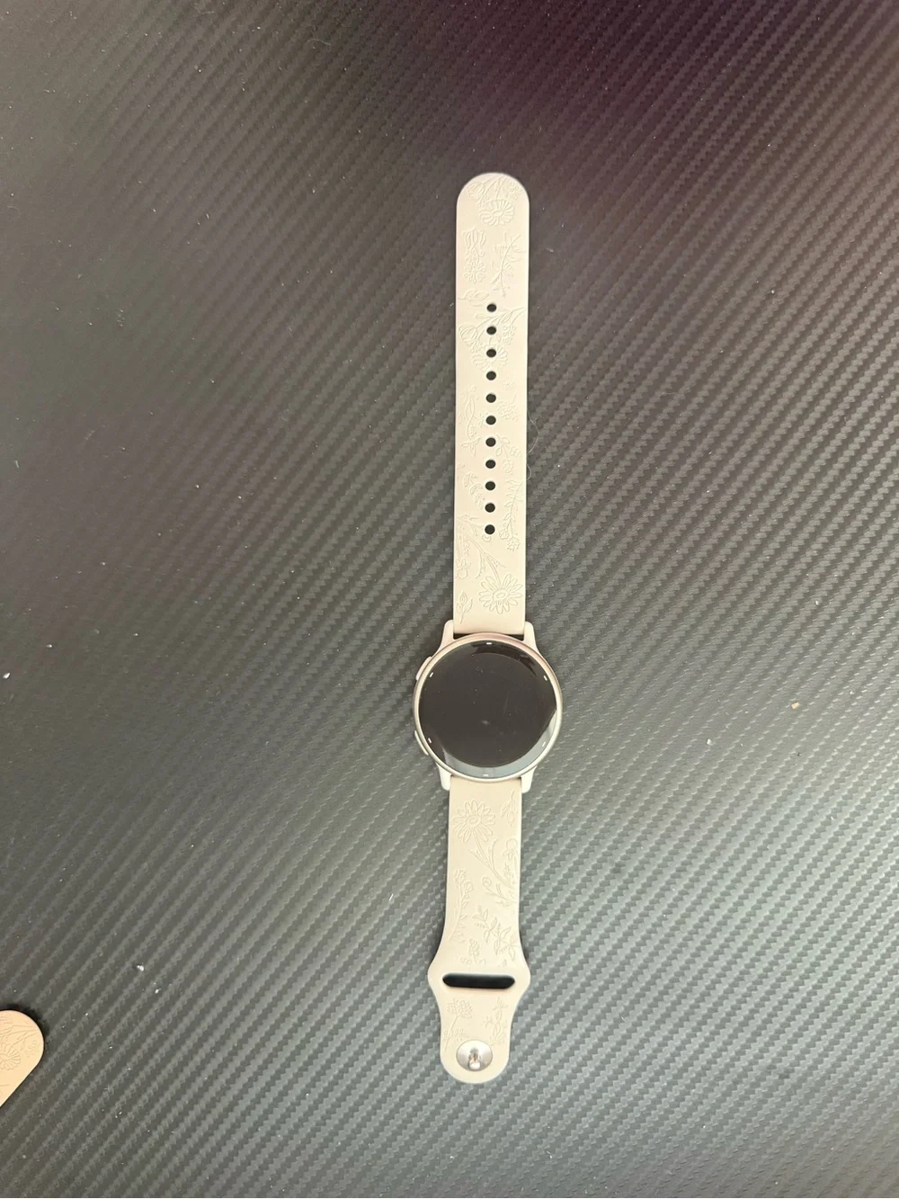 garmin white fitness GPS watch with silicone band